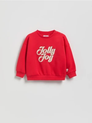 Reserved - Bluza ze świątecznym napisem - czerwony