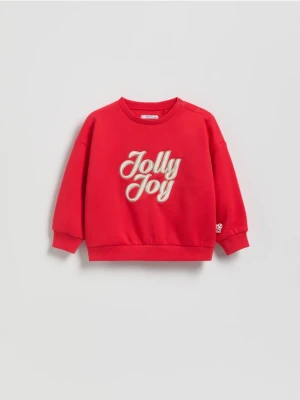 Reserved - Bluza ze świątecznym napisem - czerwony