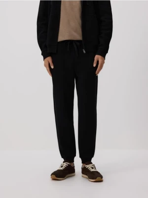 Reserved - Dresowe spodnie jogger z bawełną - czarny