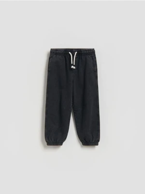 Reserved - Dresowe spodnie z efektem sprania - czarny