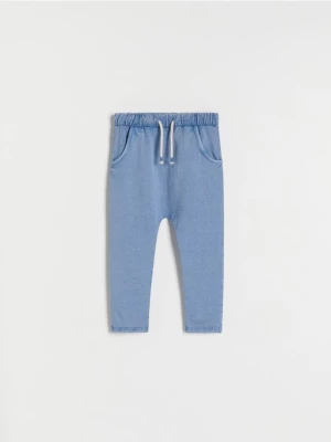 Reserved - Dresowe spodnie z efektem sprania - niebieski
