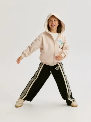 Reserved - Dresowe spodnie z lampasem - czarny