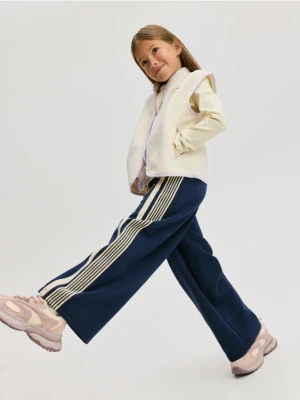 Reserved - Dresowe spodnie z lampasem - granatowy