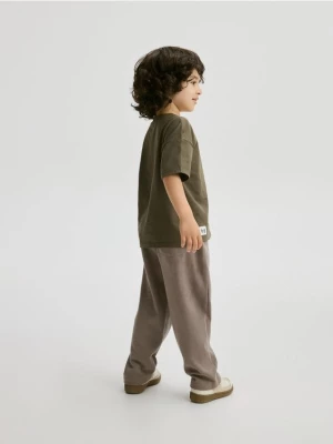 Reserved - Dresowe spodnie z przeszyciami - brązowy