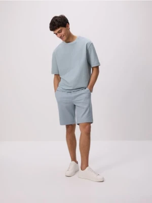 Reserved - Dresowe szorty regular fit - morski