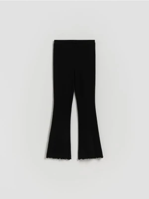 Reserved - Dzianinowe legginsy w prążek - czarny