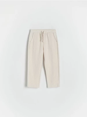 Reserved - Dzianinowe spodnie chino - złamana biel