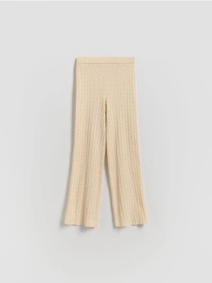 Reserved - Dzianinowe spodnie flare - złamana biel