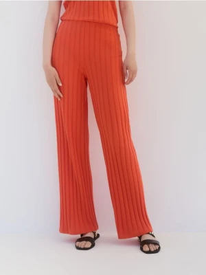 Reserved - Dzianinowe spodnie - pomarańczowy
