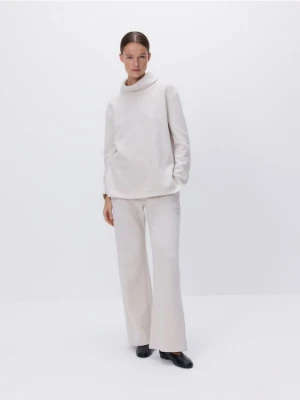 Reserved - Dzianinowe spodnie z bawełną - beżowy