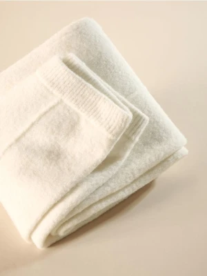 Reserved - Dzianinowe spodnie z domieszką wełny - złamana biel