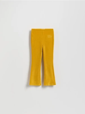 Reserved - Dzianinowe spodnie z haftem - bursztynowy