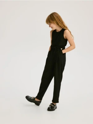 Reserved - Dzianinowy kombinezon - czarny