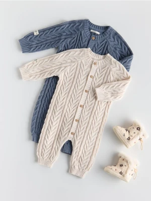 Reserved - Dzianinowy kombinezon - kremowy