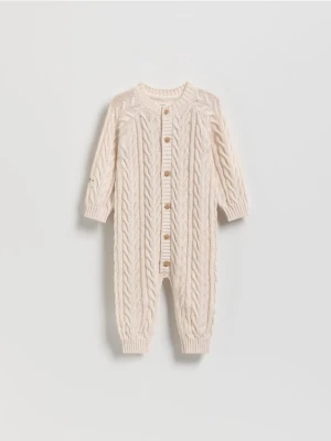 Reserved - Dzianinowy kombinezon - kremowy