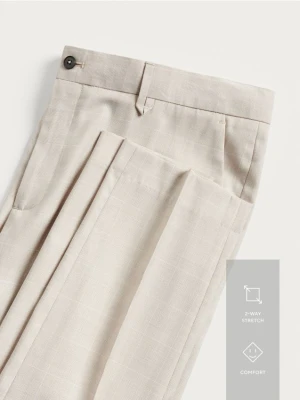 Reserved - Garniturowe spodnie slim fit - beżowy