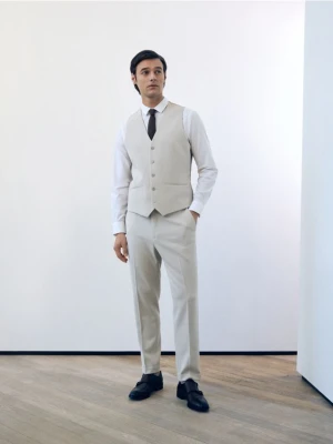 Reserved - Garniturowe spodnie w kant - beżowy