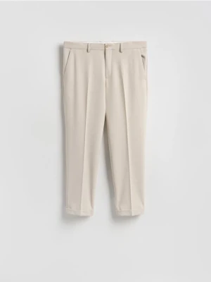 Reserved - Garniturowe spodnie w kant - beżowy