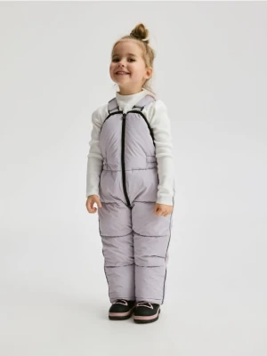 Reserved - Gumowane spodnie na szelkach - lawendowy