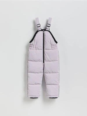 Reserved - Gumowane spodnie na szelkach - lawendowy