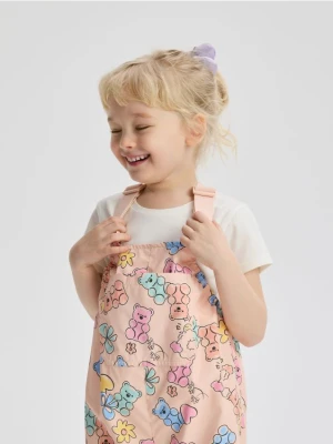 Reserved - Gumowane spodnie na szelkach - wielobarwny