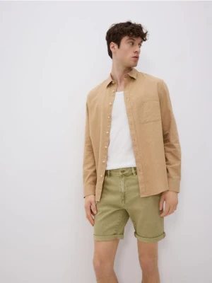 Reserved - Jeansowe szorty slim fit - zielony