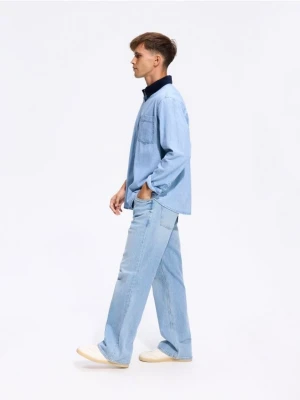 Reserved - Jeansy bootcut z efektem sprania - niebieski