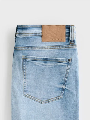 Reserved - Jeansy carrot slim z przetarciami - niebieski