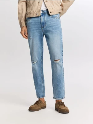 Reserved - Jeansy carrot slim z przetarciami - niebieski
