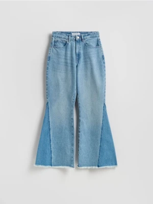 Reserved - Jeansy flare z łączonych materiałów - niebieski