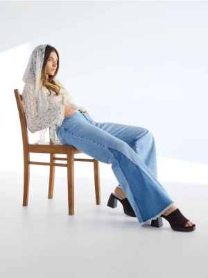 Reserved - Jeansy flare z łączonych materiałów - niebieski