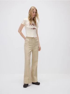 Reserved - Jeansy flare z przeszyciem - złamana biel