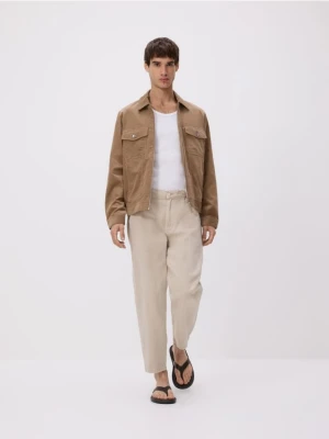 Reserved - Jeansy jogger fit - beżowy