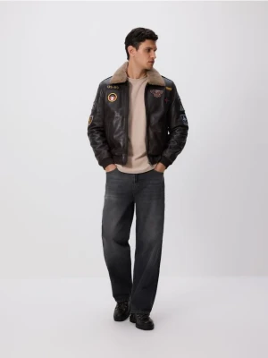 Reserved - Jeansy loose z efektem sprania - szary