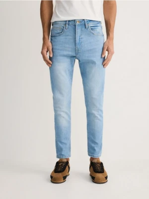 Reserved - Jeansy skinny z efektem sprania - niebieski