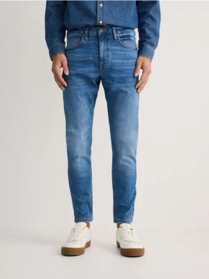 Reserved - Jeansy skinny z efektem sprania - niebieski
