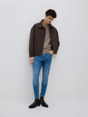 Reserved - Jeansy skinny z efektem sprania - niebieski