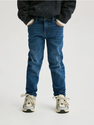 Reserved - Jeansy slim z dziurami - niebieski