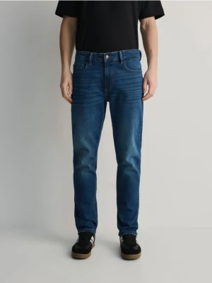 Reserved - Jeansy slim z efektem sprania - niebieski
