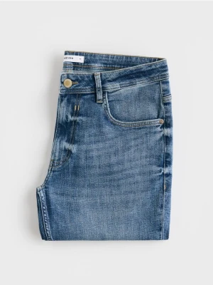Zdjęcie produktu Reserved - Jeansy slim z efektem sprania - niebieski