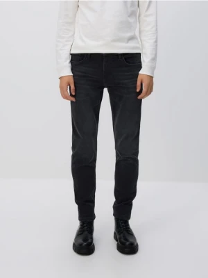 Reserved - Jeansy slim z efektem sprania - szary