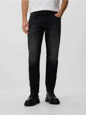 Reserved - Jeansy slim z efektem sprania - szary