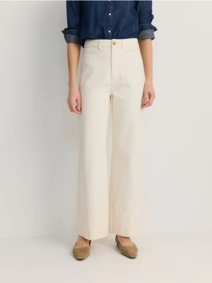 Reserved - Jeansy wide leg - beżowy
