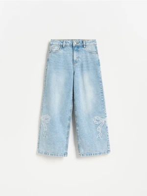 Reserved - Jeansy wide leg z kokardkami - niebieski