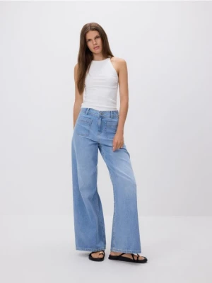 Reserved - Jeansy wide leg z naszywanymi kieszeniami - niebieski