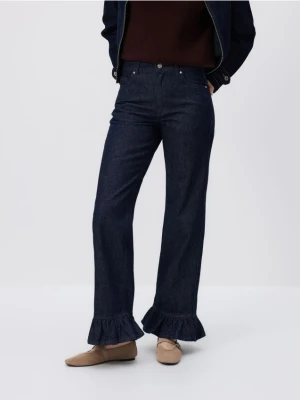 Reserved - Jeansy z falbankami - granatowy
