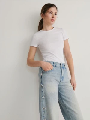 Reserved - Jeansy z ozdobną aplikacją - niebieski