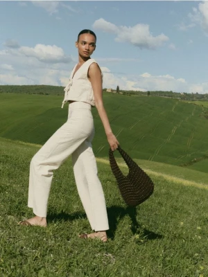 Reserved - Jeansy z szerokimi nogawkami - kremowy