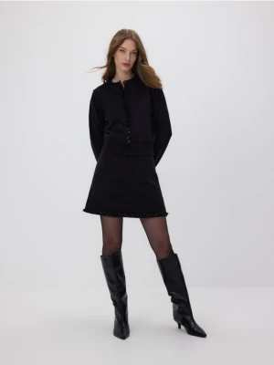 Reserved - Kardigan z ozdobnym wykończeniem - czarny