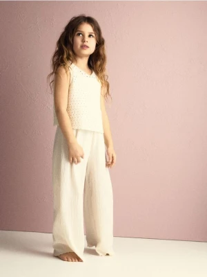 Reserved - Kombinezon z ażurowym topem - złamana biel